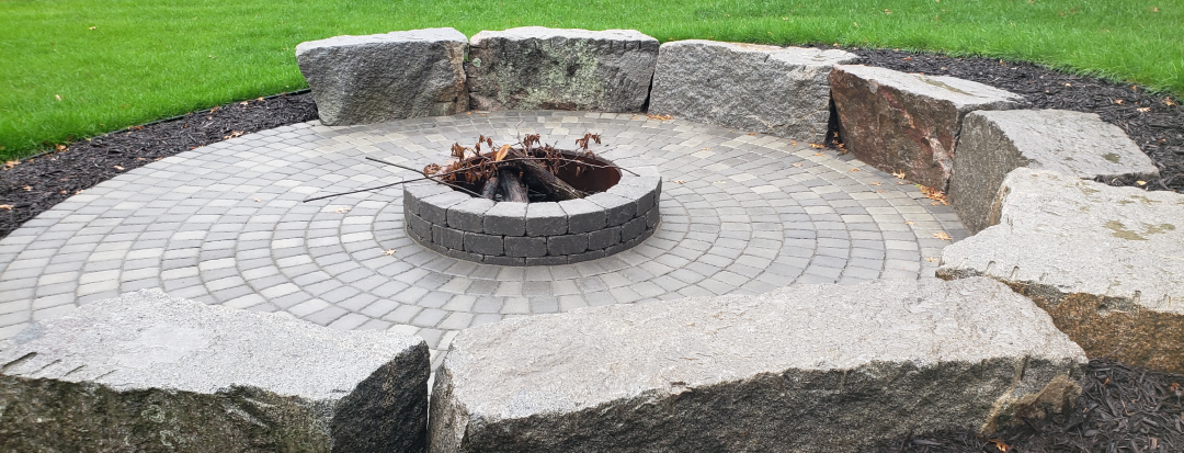 Granite boulders, Borgert Cobble pavers with Borgert Strassen fire pit. Oak Grove MN